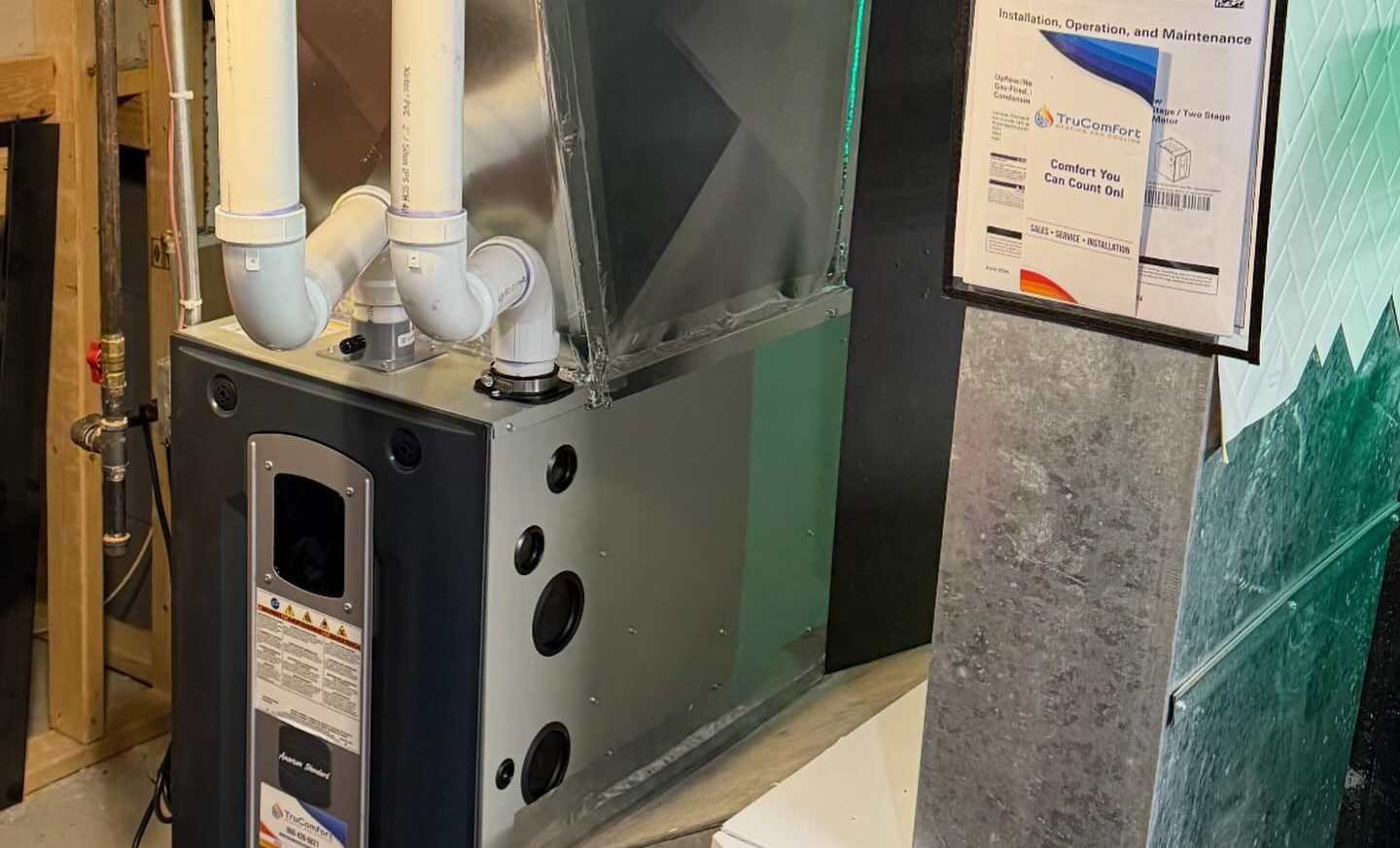 New gas furnace installation in Southington Connecticut with PVC venting and sealed ductwork.